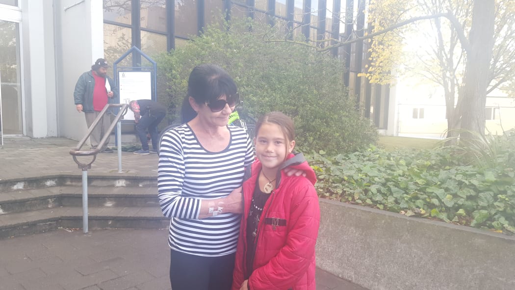 Renee Duckmanton's aunty Sue McGrath and her 9-year-old sister Madison outside Christchurch District Court.