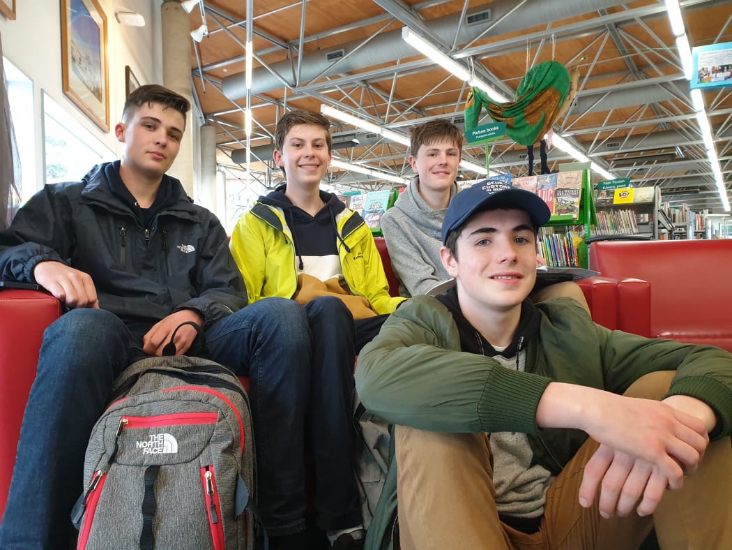 Caleb Stanley-Dwyer (left), Christopher McLellan, Alexander Telfar, and Lawrence White (front) at the Ruth Gotlieb Library in Kilbirnie Wellington.
