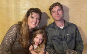 Vickie Hudson-Craig with her husband Ryan and daughter Ruby.