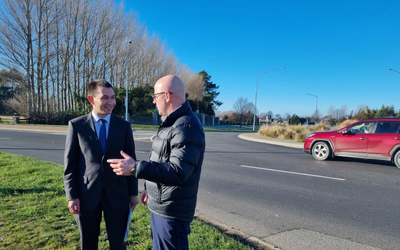 Transport Minister Simeon Brown and Waimakariri MP Matt Doocey at the Pegasus roundabout on 5 July, 2024.