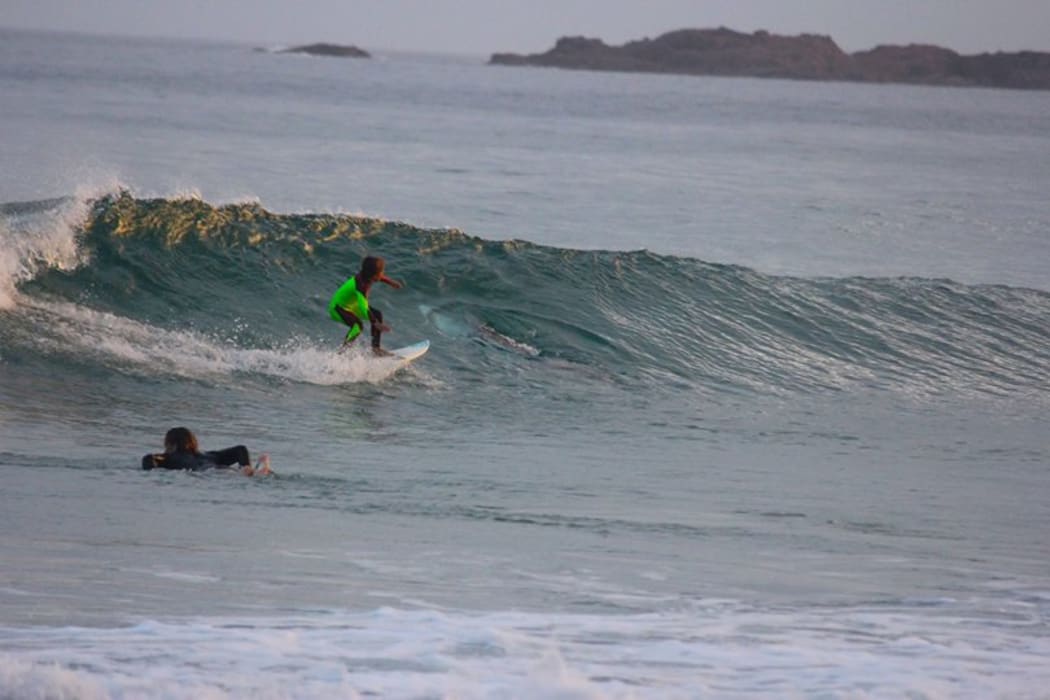 Eden Hasson, 10, surfing above a 3 metre Great White Shark in New South Wales