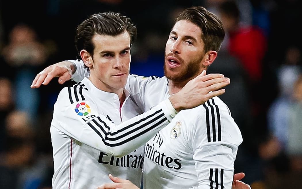 Real Madrid players embrace.