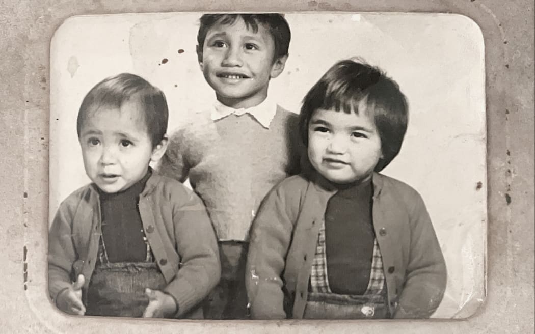 Joyce Harris (left) and her twin sister Toni, as children in an old family photo.