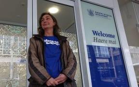 Advocate stands outside WINZ office
