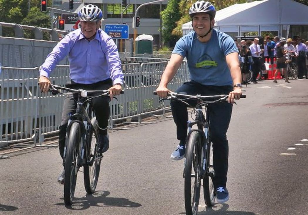 Len Brown and Simon Bridge both on bikes
