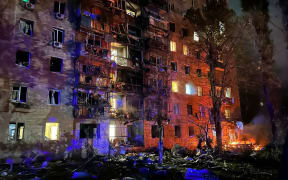 This photograph released on August 11, 2024 on the official Telegram account of Kursk Mayor Igor Kutsak shows a fire in a residential building following a missile attack in Kursk, Russia. (Photo by Handout / TELEGRAM / @glavaigorkutsak / AFP) / RESTRICTED TO EDITORIAL USE - MANDATORY CREDIT "AFP PHOTO / Telegram account @glavaigorkutsak" - NO MARKETING NO ADVERTISING CAMPAIGNS - DISTRIBUTED AS A SERVICE TO CLIENTS