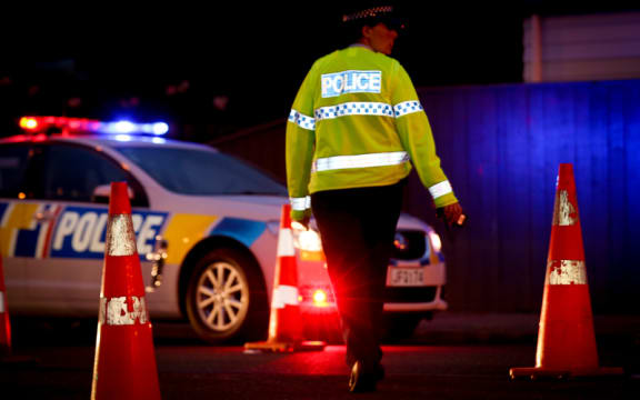 A police officer at an alcohol check point.