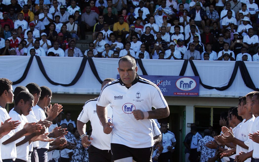 A photo of Fiji captain Simon Raiwalui leads his team out for the IRB Pacific 5 Nations rugby match between the Junior All Blacks and Fiji at Post Fiji Stadium, Suva, Fiji on Saturday 3 June, 2006. The Junior All Blacks won the match 37 - 15. 




030606