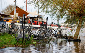 Lower parts of the quay at the Waalkade in Nijmegen, the Netherlands, underwater in November 2023 - the first time in over 20 years that the water levels in the Rhine and Waal have been so high in November.  (Photo by Romy Arroyo Fernandez/NurPhoto) (Photo by Romy Arroyo Fernandez / NurPhoto / NurPhoto via AFP)