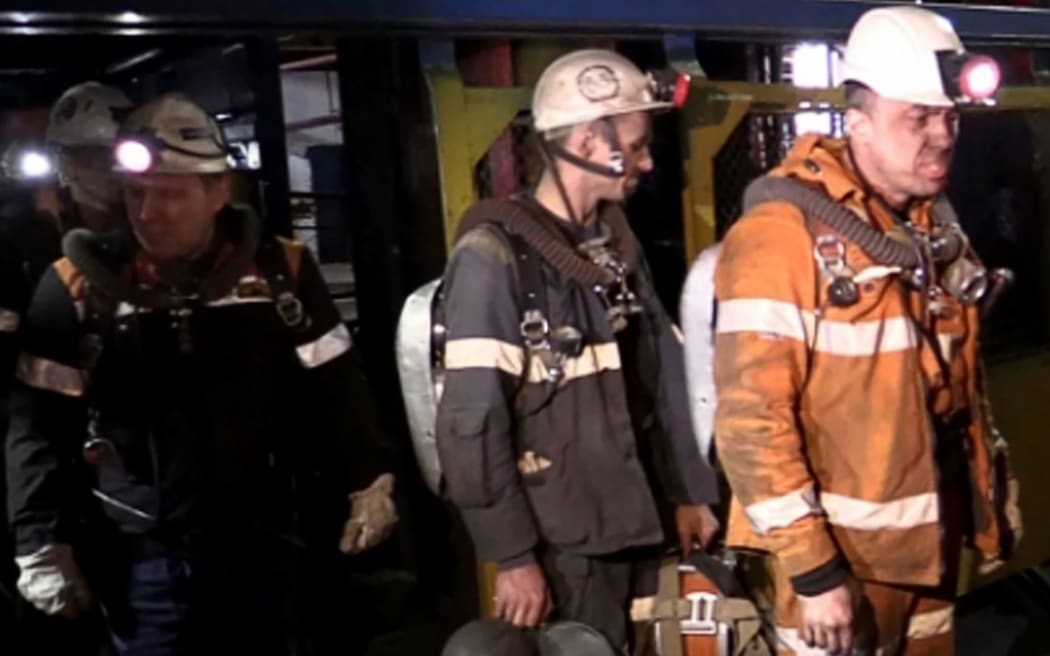 Rescuers at the Severnaya coal mine in Vorkuta, Russia. Thirty six people are presumed dead after an explosion.