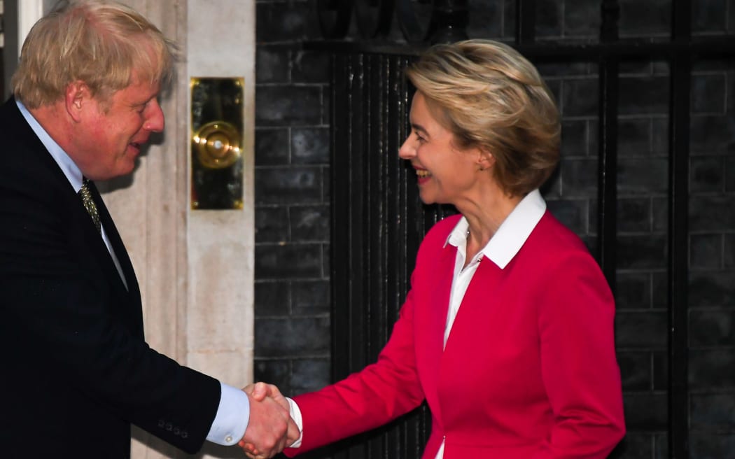 Britain's Prime Minister Boris Johnson greets European Commission President Ursula von der Leyen outside 10 Downing Street in central London on January 8, 2020,