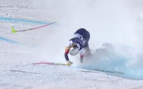 Lindsey Vonn crashing during the women's downhill event at the Milano Cortina Winter Olympics.