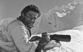 Frank Erceg doing what he loved in Godley Valley, Summit Ridge. This photo was first published in The Weekly News, 11 October 1961