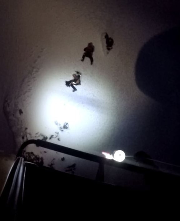 Trapped climbers are rescued from Mt Taranaki in a daring night rescue.