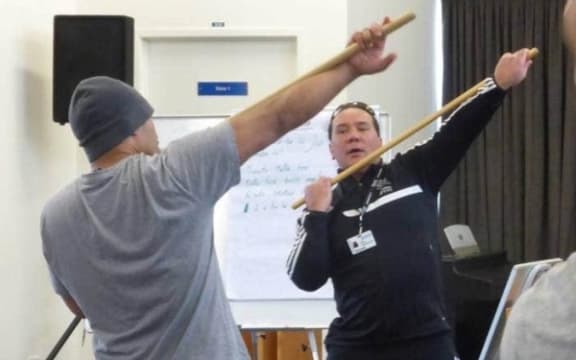 Jade Morgan teaching his tikanga programme "Te Hōkai Manea Tipuna"