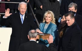 Joe Biden is sworn in as the 46th US President by Supreme Court Chief Justice John Roberts on January 20, 2021, at the US Capitol in Washington, DC. (Photo by SAUL LOEB / POOL / AFP)