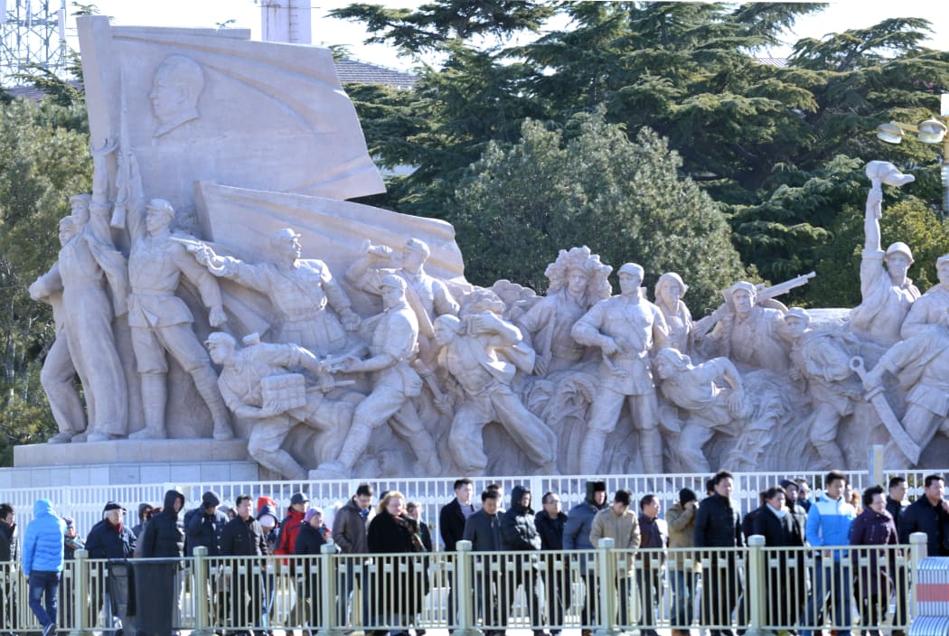 Visitors queue outside the Mao Zedong mausoleum in Beijing.