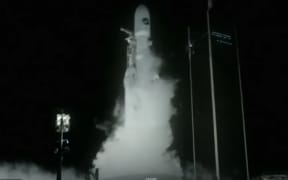 The U.S. military's secretive X-37B robot spaceplane lifts off on its seventh mission to orbit, the vehicle's first launch atop a SpaceX Falcon Heavy rocket capable of lofting it far higher than ever before.