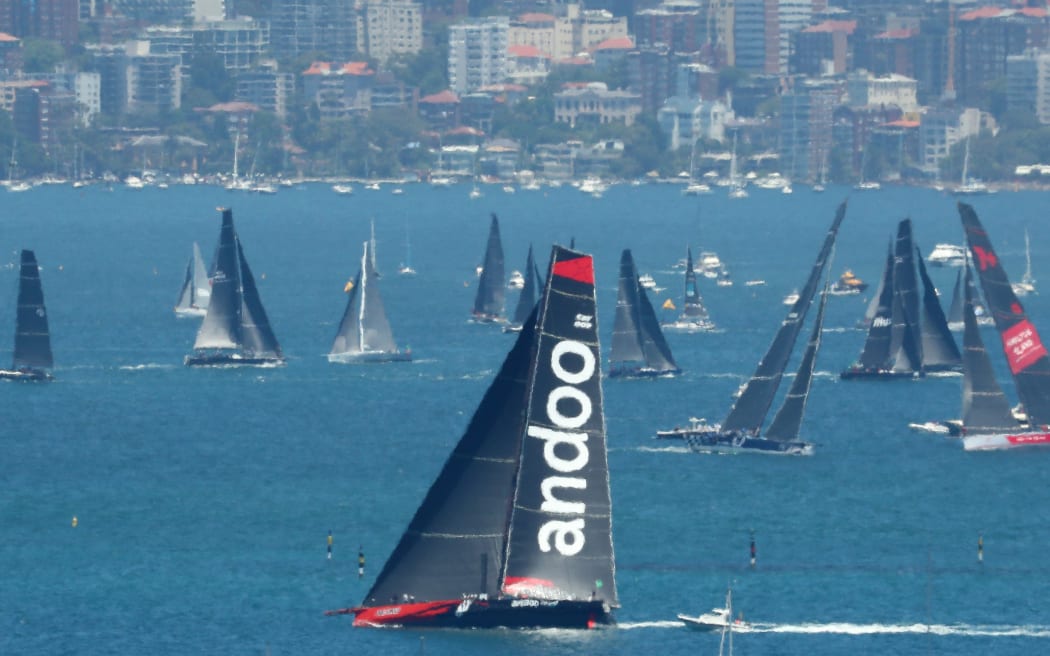 Andoo Comanche prepares for the start of the Sydney to Hobart Yacht race seen from North Head in Sydney.