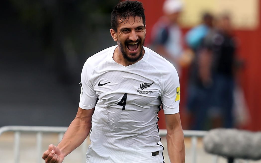 Themistoklis Tzimopoulos celebrates his goal.