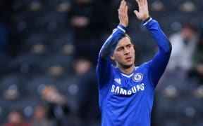 Chelsea winger Eden Hazard applauds the fans.
