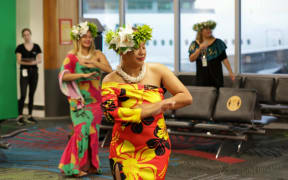 Dancers at Auckland Airport to mark the first flight to Rarotonga under the Cook Islands travel bubble.