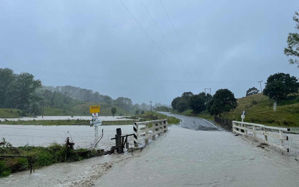 Floodwater covers Fairlies Bridge, north of Te Puia, as Cyclone Gabrielle brings heavy rain to the Tairāwhiti region.