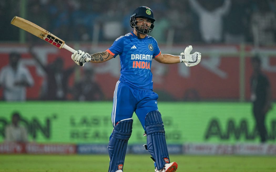India's Rinku Singh celebrates after winning the first Twenty20 international cricket match against Australia, 2023.