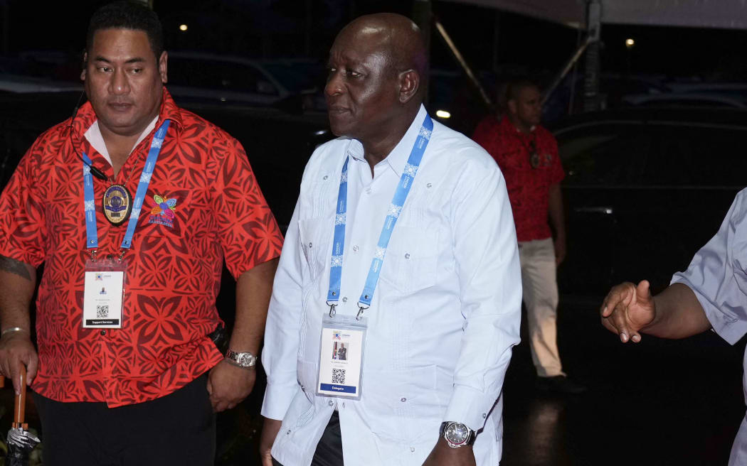 Johnny Sexwale (C), South African High Commissioner to New Zealand, Cook Islands, Fiji, Samoa and Vanuatu, arrives at the official welcome reception for the Commonwealth Heads of Government Meeting (CHOGM) in Apia on October 24, 2024. (Photo by Rick Rycroft / POOL / AFP)