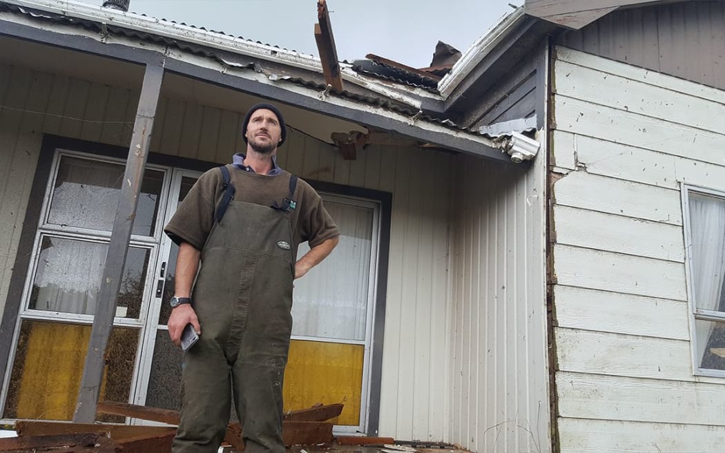 Rahotu farmer Jordy Mullen says he and a mate were left "hanging on for dear life" as a tornado passed over the milking shed.