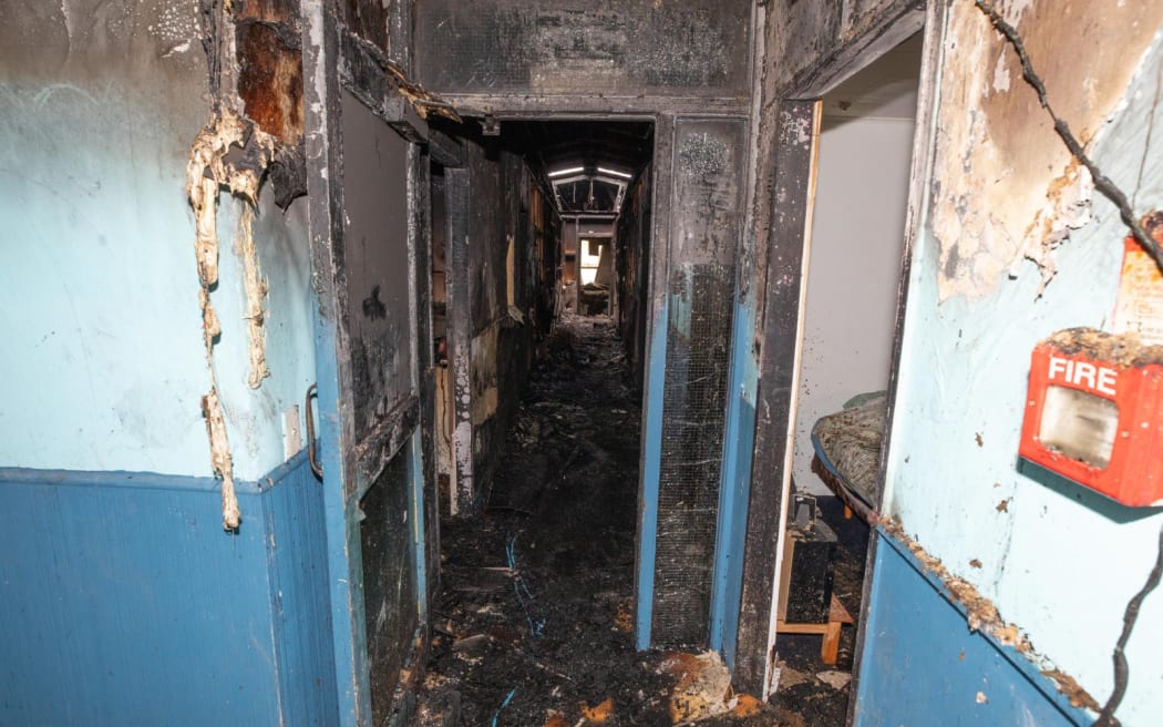 A burned-out corridor in  Berkenhoff Lodge, Taupō, where fire investigators found multiple safety breaches.