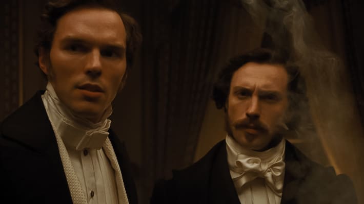 "We were both very happy when we got the call from Robert," Aaron Taylor-Johnson said of getting to work with his longtime friend Nicholas Hoult.