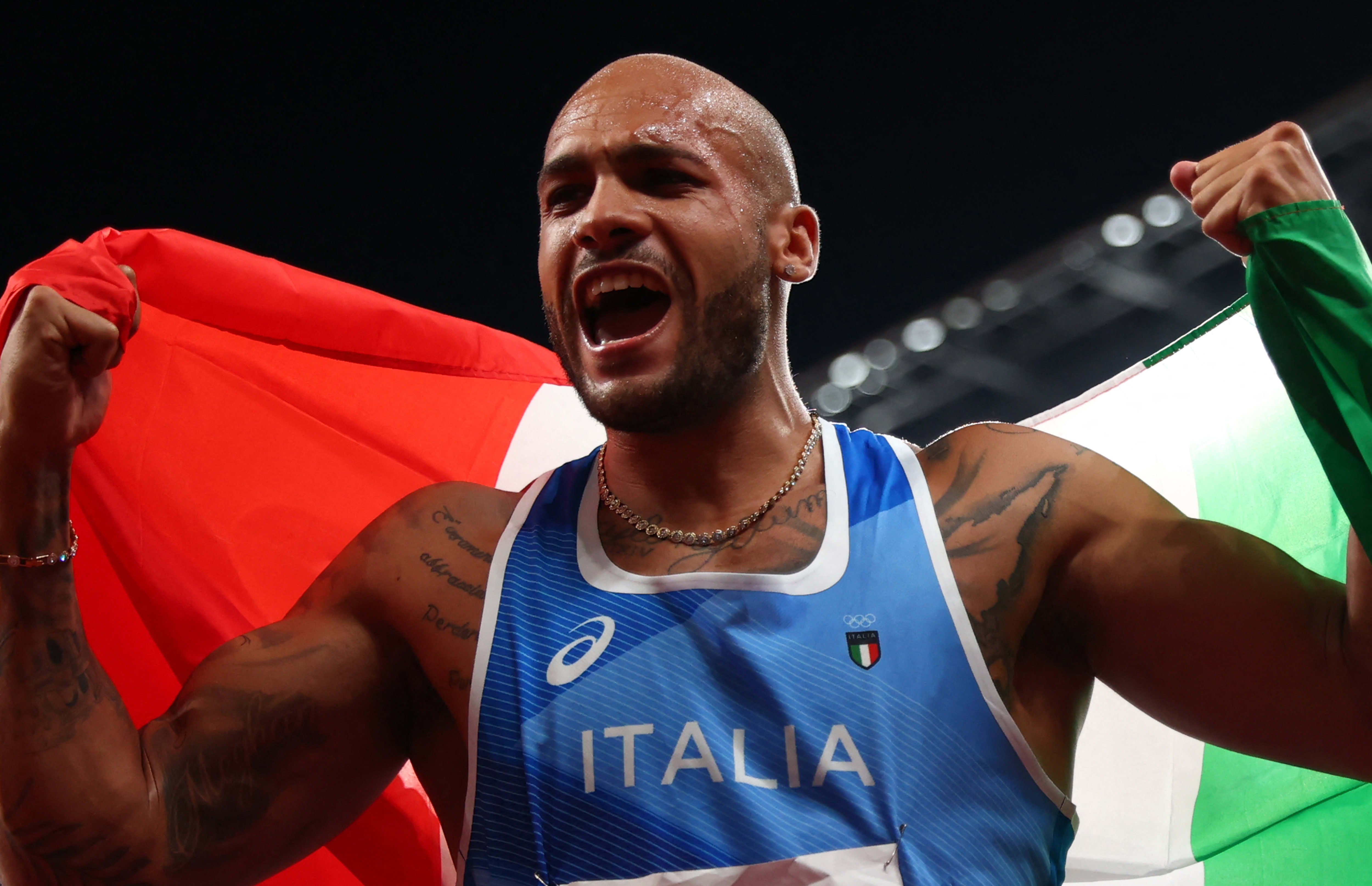 Lamont Marcell Jacobs of Italy reacts after winning Athletics men's 100m in Tokyo Olympic Games at Olympic Stadium in Tokyo on 1 August 2021.