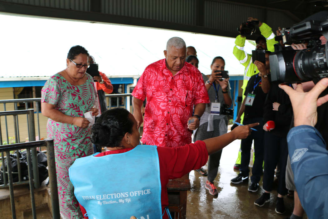 Frank Bainimarama on his way to vote