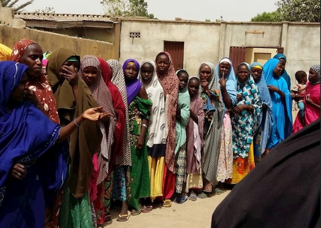 Displaced Nigerian women queuing for NZ donated goods. Maiduguri, 2016