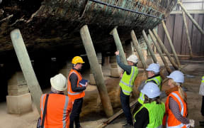 Maritime preservation experts examine the Edwin Fox at Picton.