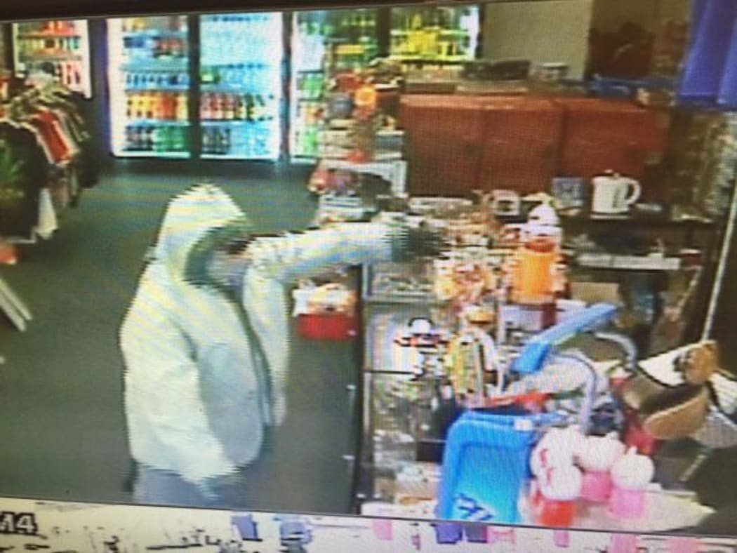 An image of the robbery taken from CCTV footage.