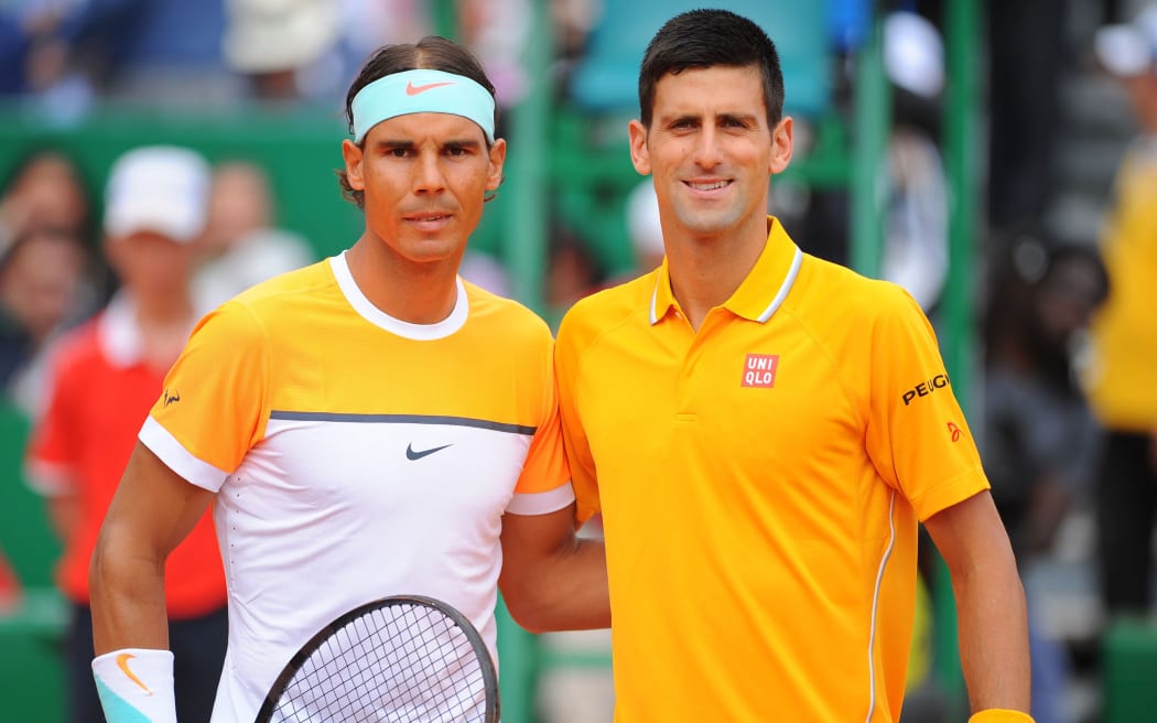 Novak Djokovic and Rafael Nadal pose before the start of their Monte Carlo semi-final, 2015.