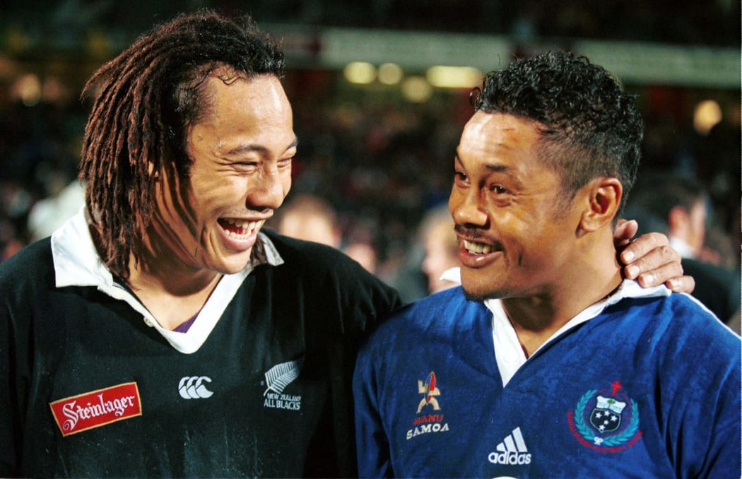 Brothers Tana and Mike Umaga share a laugh after the All Blacks played Manu Samoa in 1999.