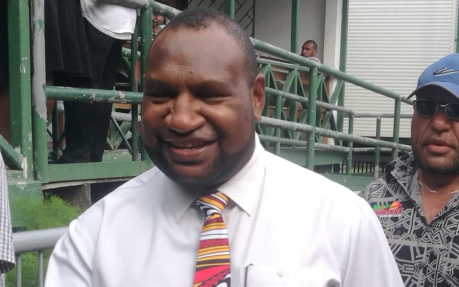 Papua New Guinea government MP James Marape outside the national court in Waigani after an electoral petition against him was dismissed.