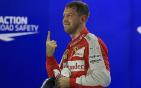 Sebastian Vettel wins pole position, Singapore, 2015.