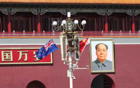 China and New Zealand flags in front of the Tian'anmen Rostrum in Beijing.