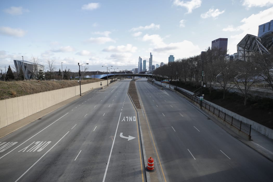 Columbus Drive is seen empty in downtown Chicago, Illinois, on March 21, 2020.