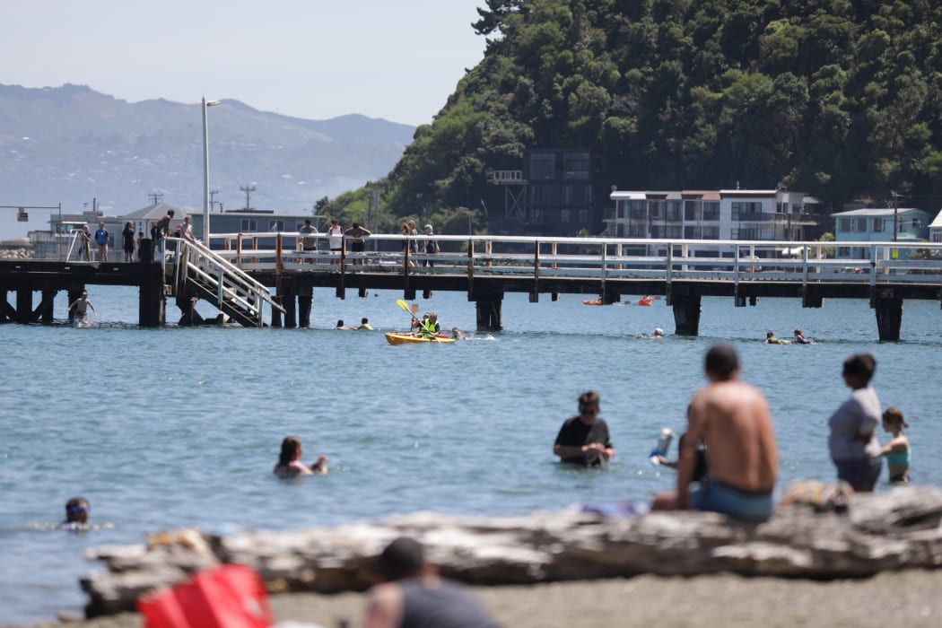 People in Wellington take to the water to cool down.