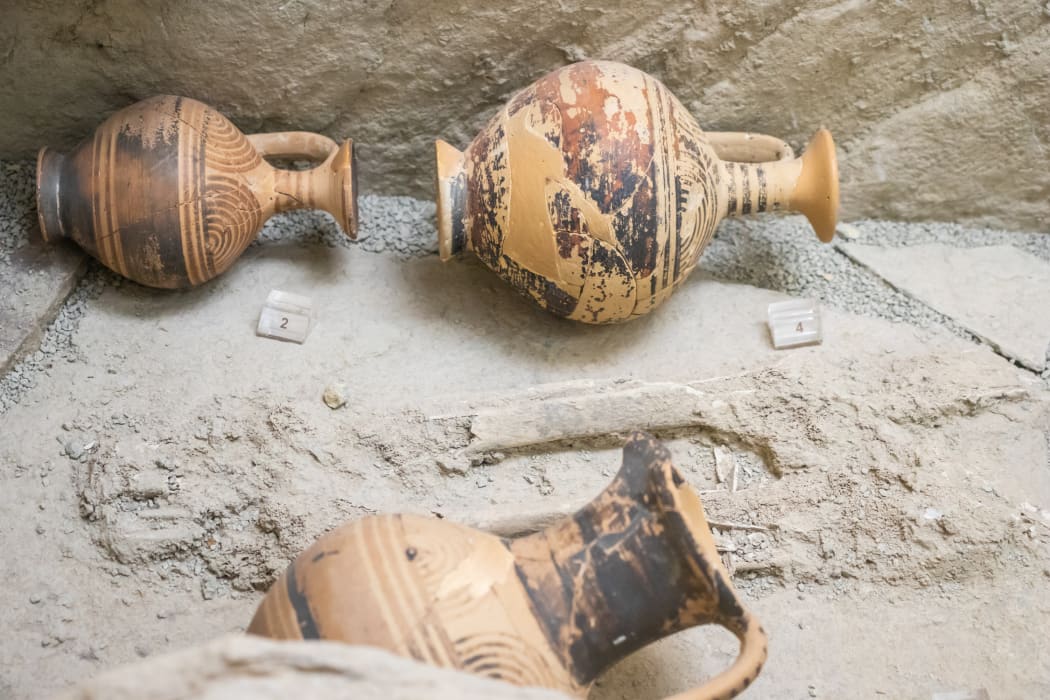Small ancient greek lekythos decorated with groups of concentric