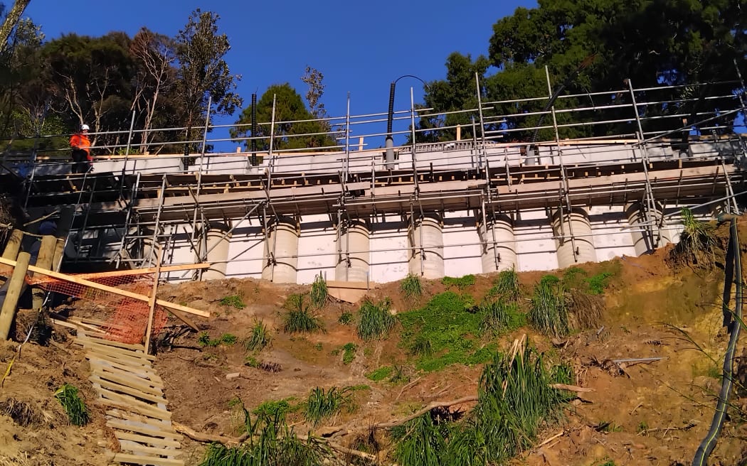 Large retaining walls replace the ground taken in an underslip.