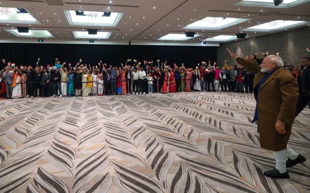 Indian Prime Minister Narendra Modi met members of the Indian community at the Cordis Hotel in Auckland after arriving on Friday evening.