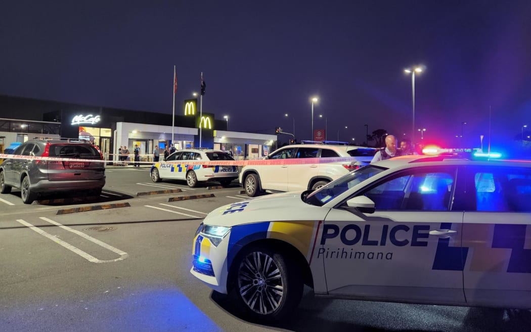 Police at the scene of an assault at McDonald's on Stoddard Road in Auckland's Mount Roskill on 11 January 2024.