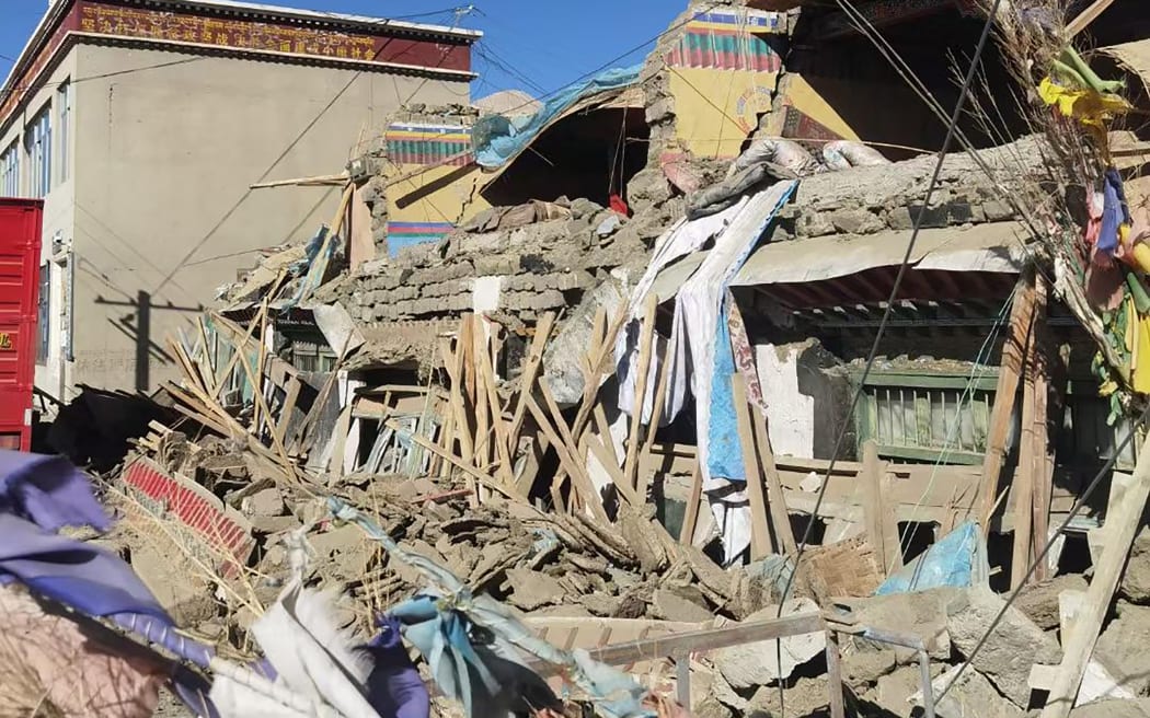 This handout received on January 7, 2025 shows damaged houses in Shigatse, southwestern China's Tibet region, after an earthquake hit the area. - A devastating earthquake in China's remote Tibet region killed at least 53 people and collapsed "many buildings" on January 7, state media reported, with tremors also felt in neighbouring Nepal's capital Kathmandu and parts of India. (Photo by AFP) / - China OUT / - CHINA OUT / -----EDITORS NOTE --- RESTRICTED TO EDITORIAL USE - MANDATORY CREDIT "AFP PHOTO / HANDOUT  " - NO MARKETING - NO ADVERTISING CAMPAIGNS - DISTRIBUTED AS A SERVICE TO CLIENTS