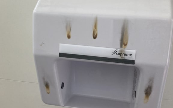 Burned hand dryer